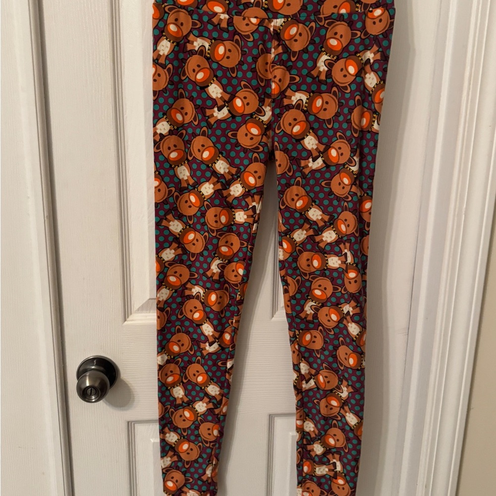 LuLaRoe Leggings with Orange and Brown Reindeer Pattern